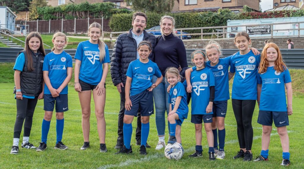 Hokulani Limited Director & Principal Investor Daniel Loitz and young Halifax FC Women players and supporters